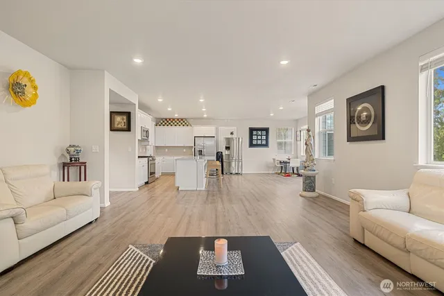a living room with furniture and a table