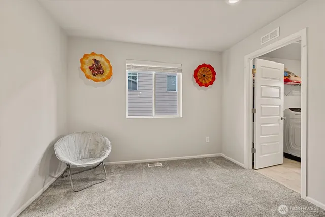 a view of an empty room and window