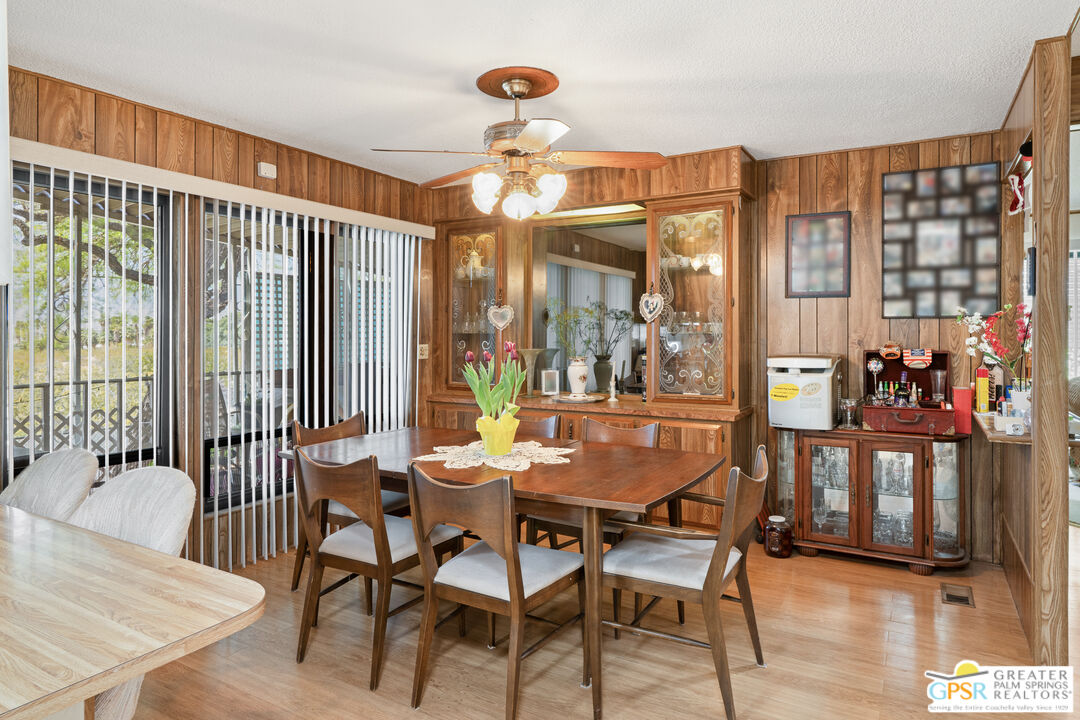 18555 Roberts Road, Unit 103 Desert Hot Springs, CA 92241 - Photo 11 of 30 a dining room with furniture and window