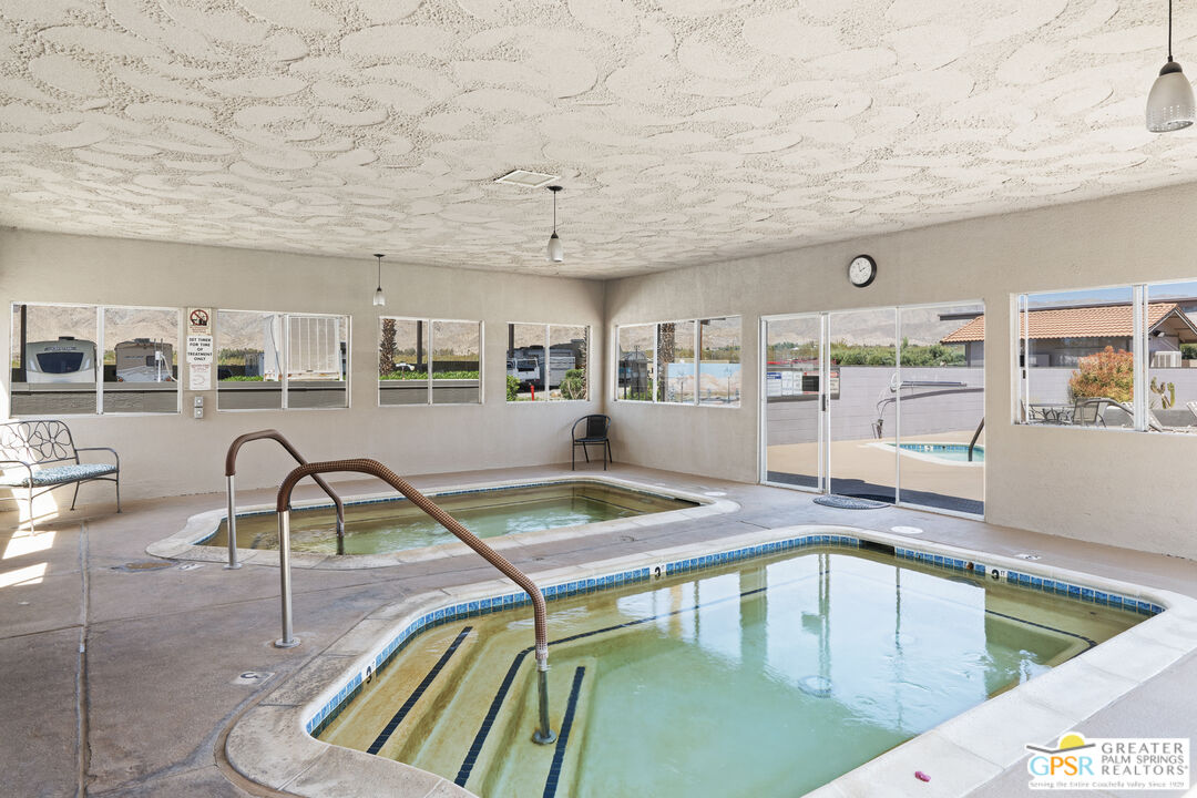 18555 Roberts Road, Unit 103 Desert Hot Springs, CA 92241 - Photo 30 of 30 a room with lots of tables and chairs