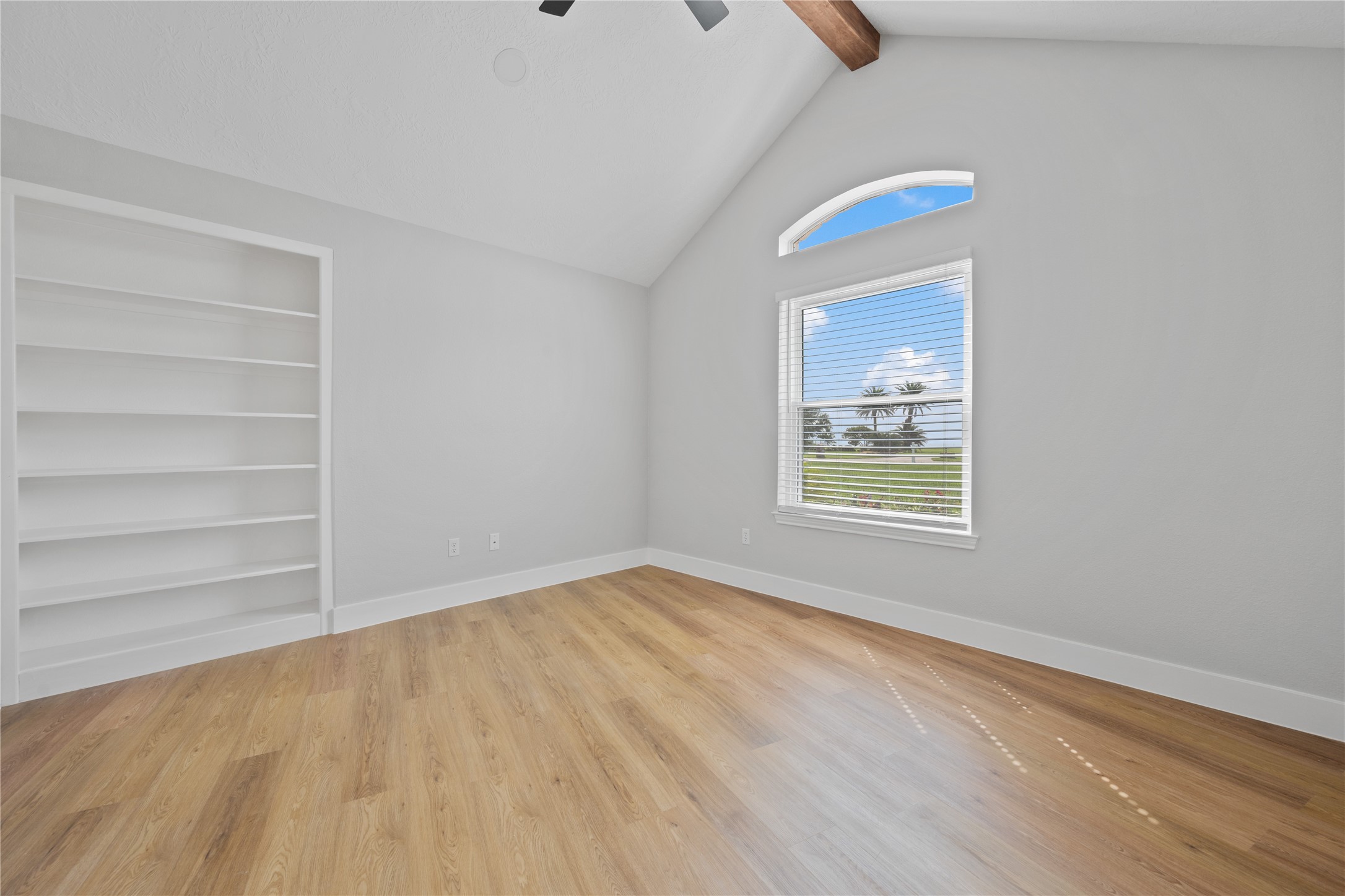 9035 Water Point Drive Beach City, TX 77523 - Photo 21 of 36 a view of an empty room with a window