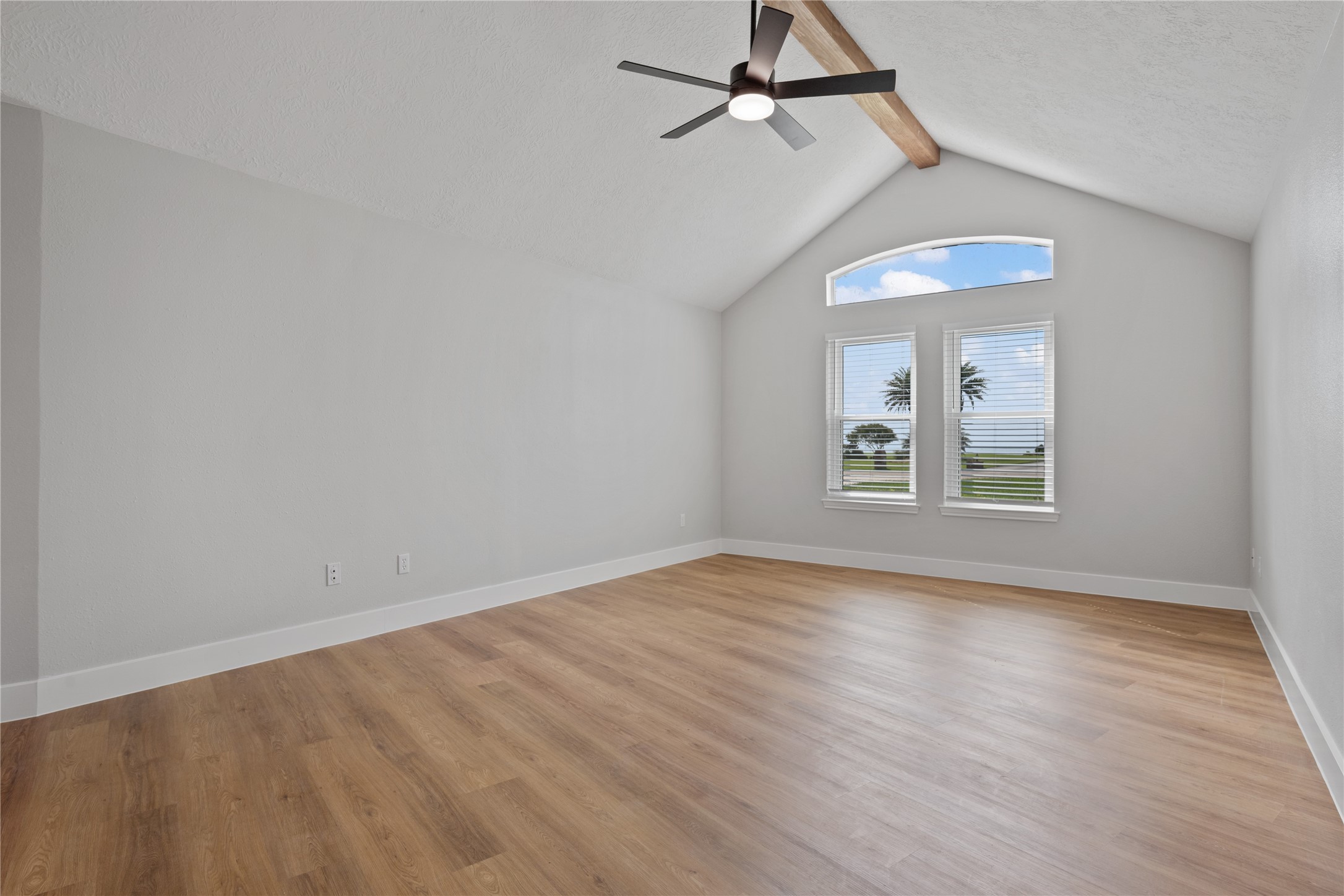 9035 Water Point Drive Beach City, TX 77523 - Photo 24 of 36 a view of empty room with wooden floor and fan