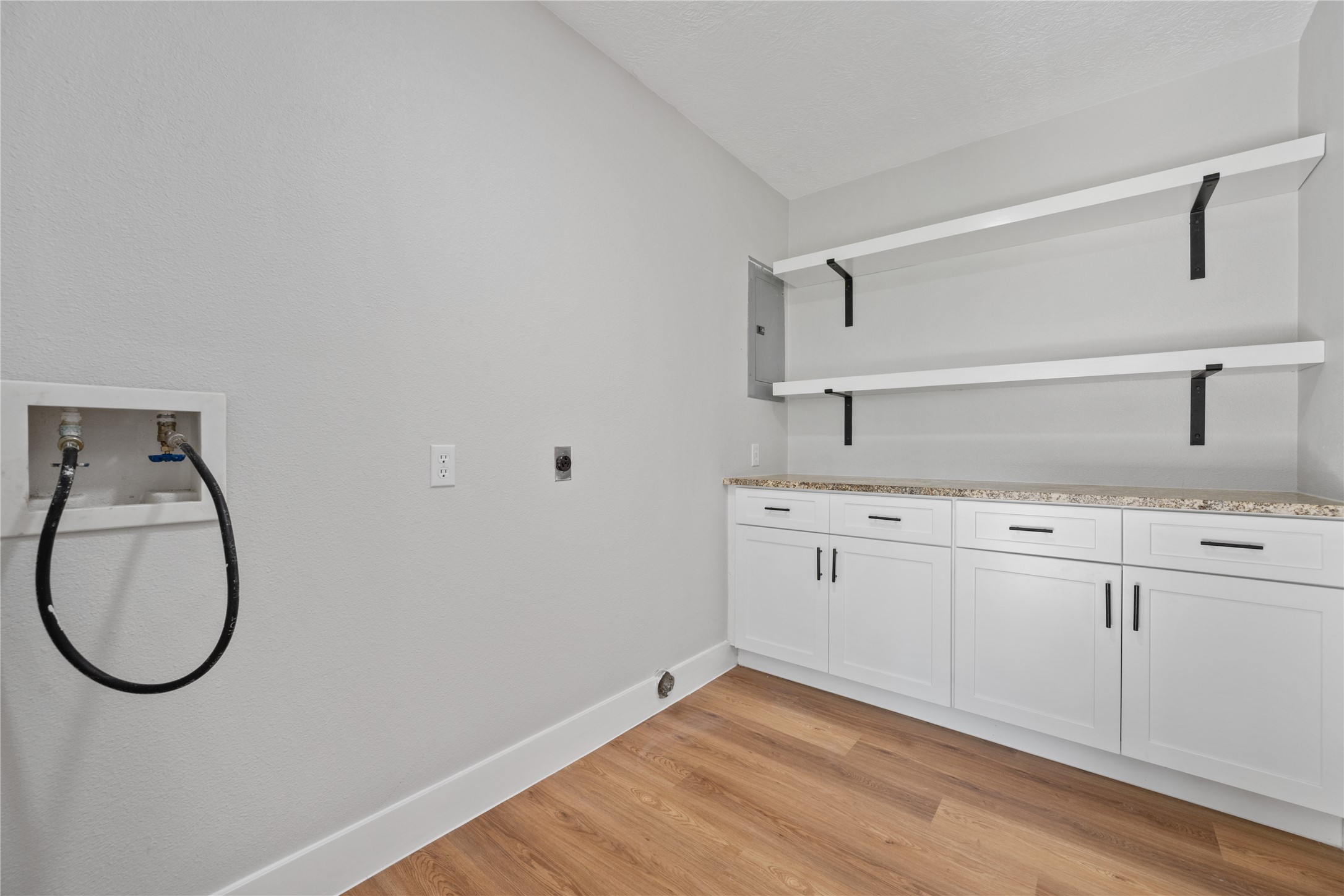 9035 Water Point Drive Beach City, TX 77523 - Photo 30 of 36 a bathroom with a sink and a mirror