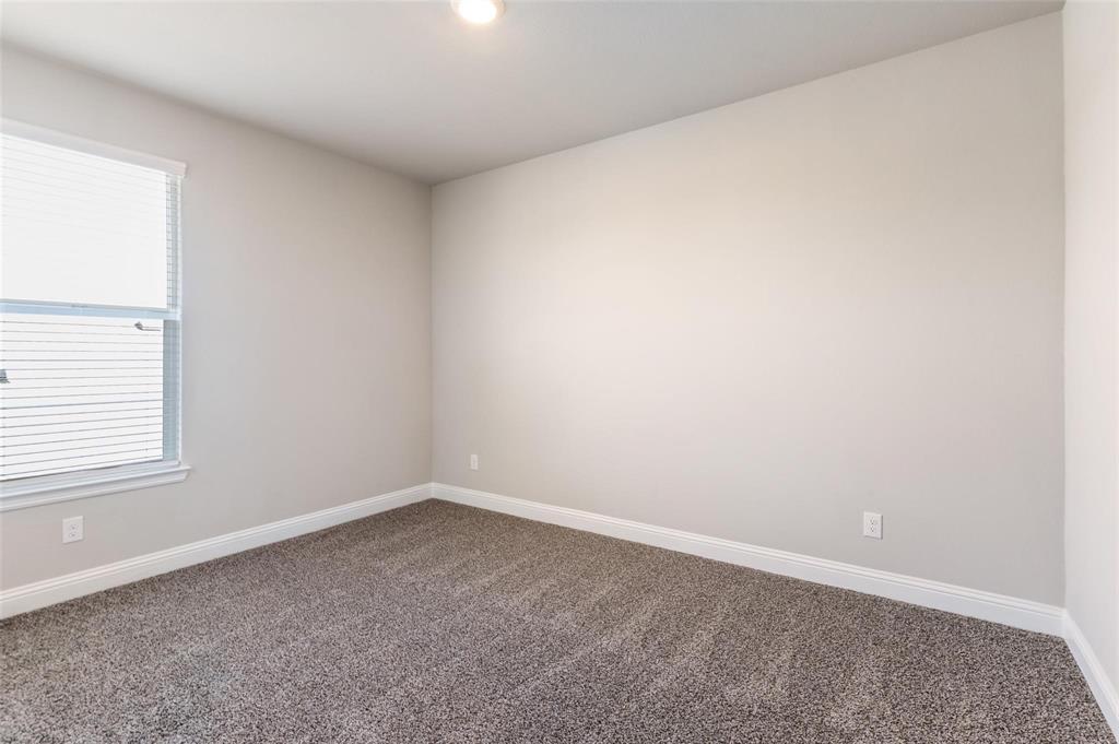 1517 Razorbill Road Denton, TX 76205 - Photo 24 of 25 Recessed lighting, neutral wall paint, carpet flooring, window with blinds, and white trim