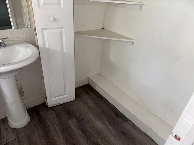 a bathroom with a sink and a toilet
