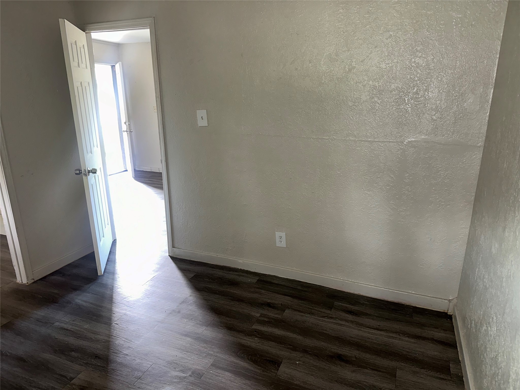 5409 Suez Street, Unit 4 Houston, TX 77020 - Photo 7 of 19 a view of entryway with wooden floor