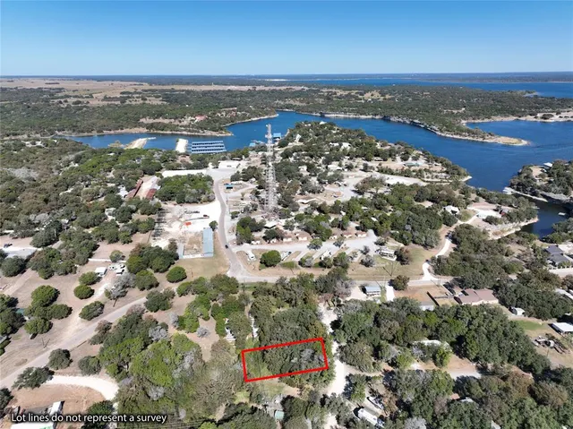 an aerial view of a city with ocean view