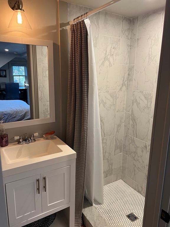 32 Buffum Street, Unit 1 Salem, MA 01970 - Photo 15 of 19 a bathroom with a sink and a mirror