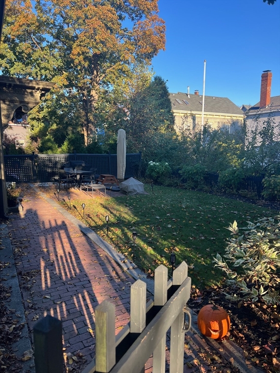 32 Buffum Street, Unit 1 Salem, MA 01970 - Photo 18 of 19 a view of a backyard with swimming pool