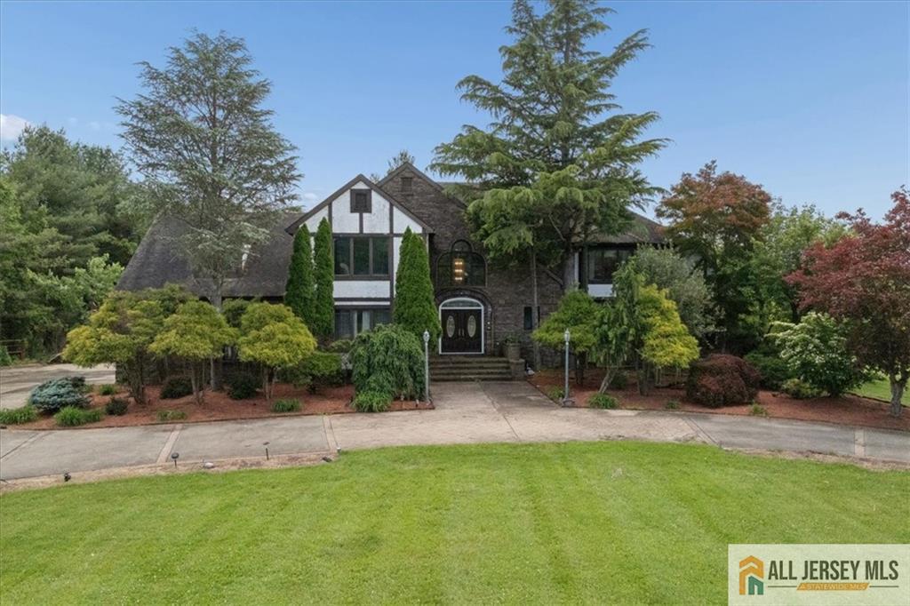 167 Federal Road Monroe Township, NJ 08831 - Photo 1 of 46 a front view of a house with a yard