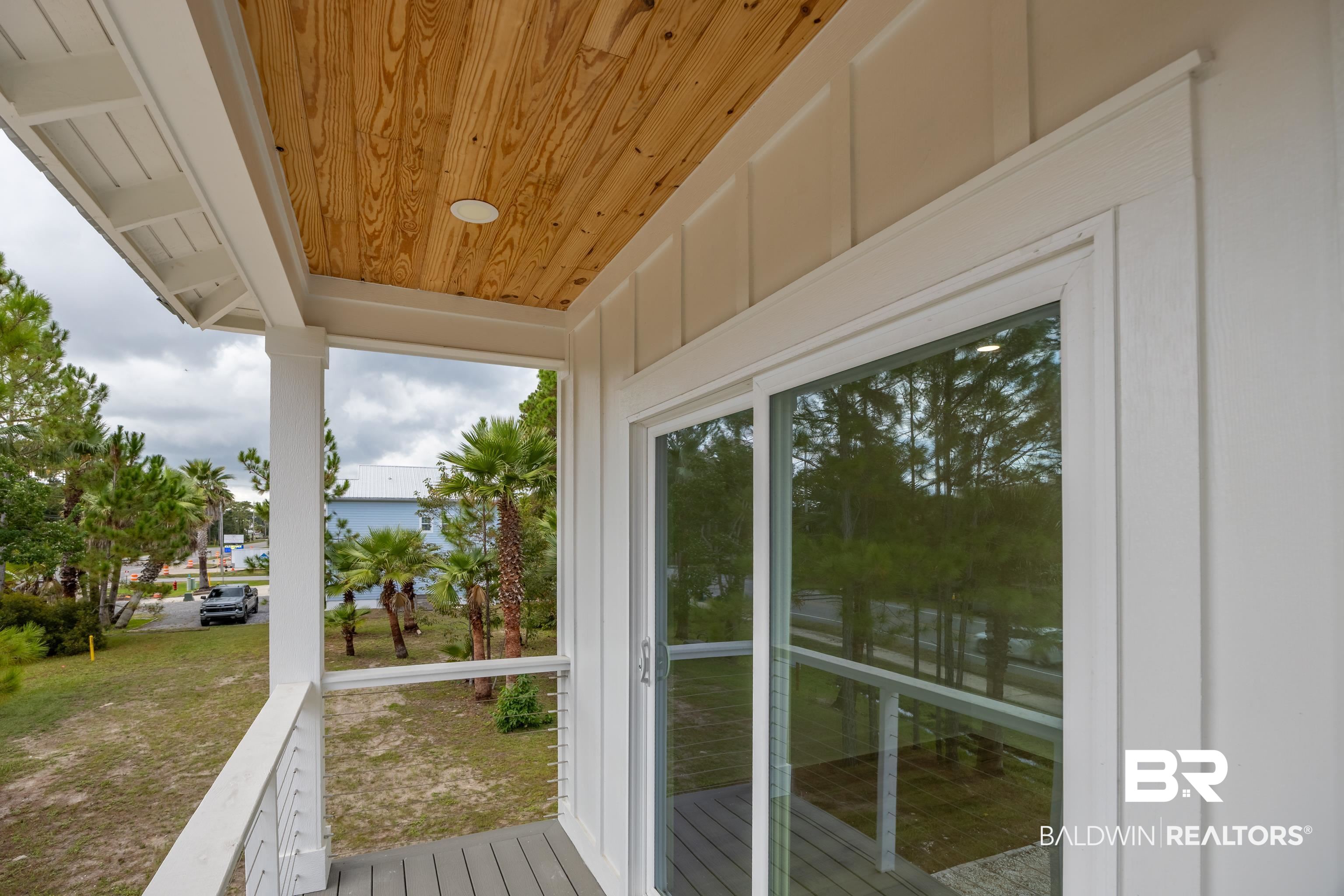 27591 Canal Road Orange Beach, AL 36561 - Photo 48 of 51 View of unfurnished sunroom