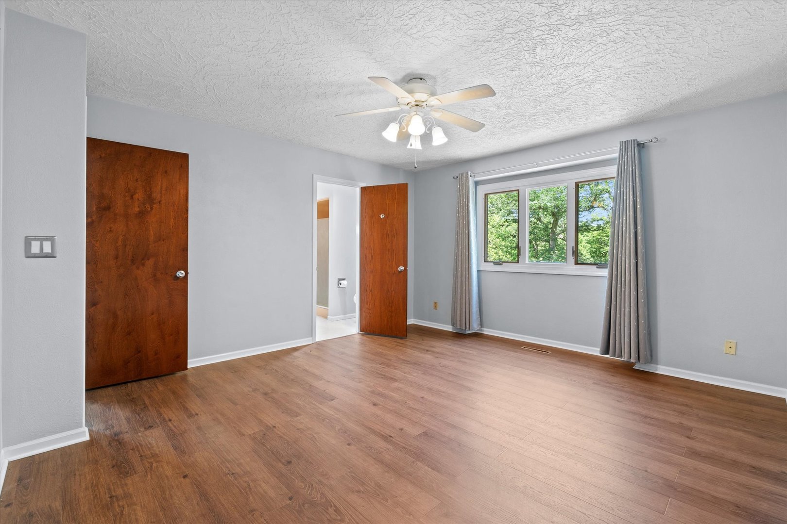 10 Oak Grove Road Geneseo, IL 61254 - Photo 24 of 43 a view of an empty room with a window