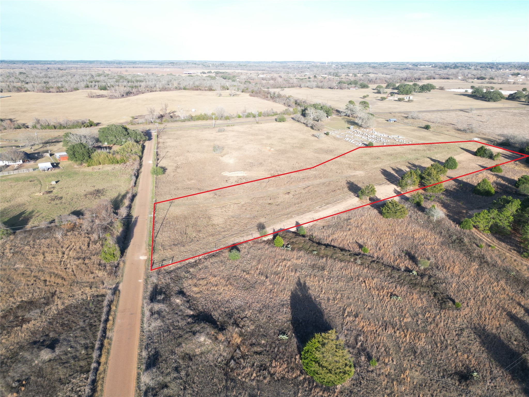 4 Trinity School Road La Grange, TX 78945 - Photo 4 of 11 An expansive rural landscape offers limitless potential with wide-open acreage and scenic country views.
