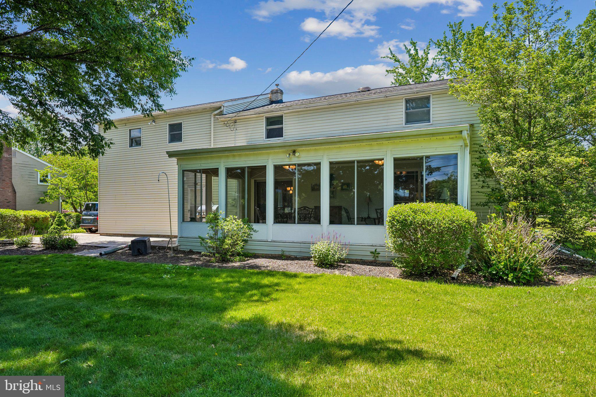 209 Upper Valley Road North Wales, PA 19454 - Photo 18 of 35 Charming home with lush green surroundings.