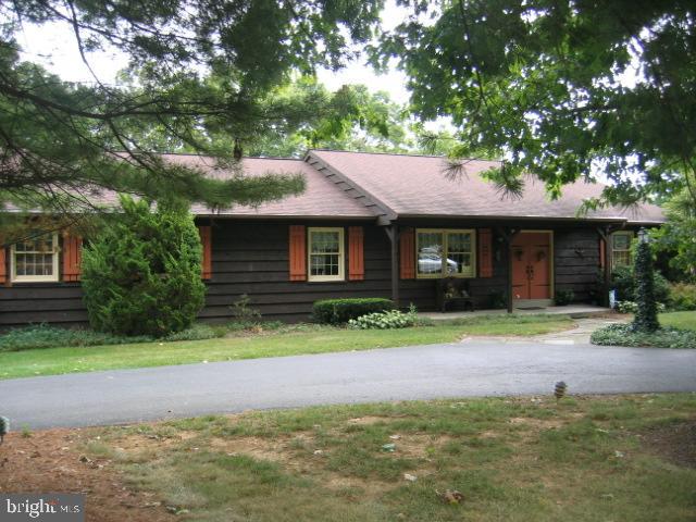 121 Royer Road Ephrata, PA 17522 - Photo 2 of 15 a front view of a house with a yard and garage