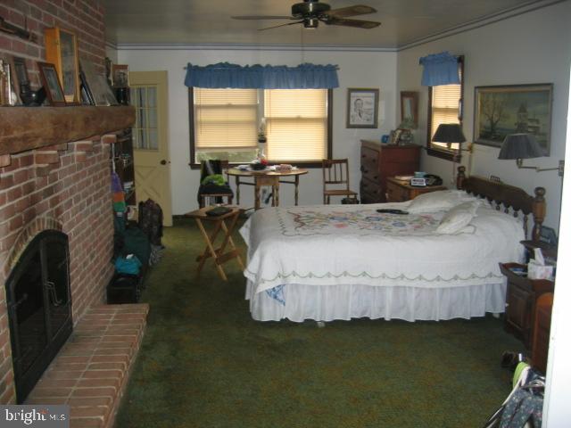 121 Royer Road Ephrata, PA 17522 - Photo 13 of 15 a living room with fireplace furniture and a large window