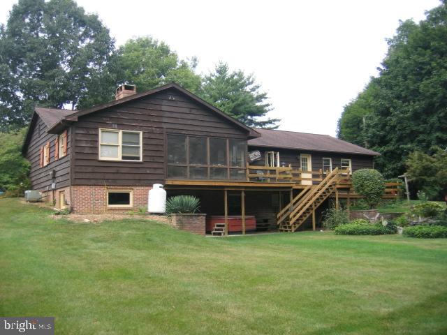 121 Royer Road Ephrata, PA 17522 - Photo 3 of 15 a view of a house with a yard and sitting area