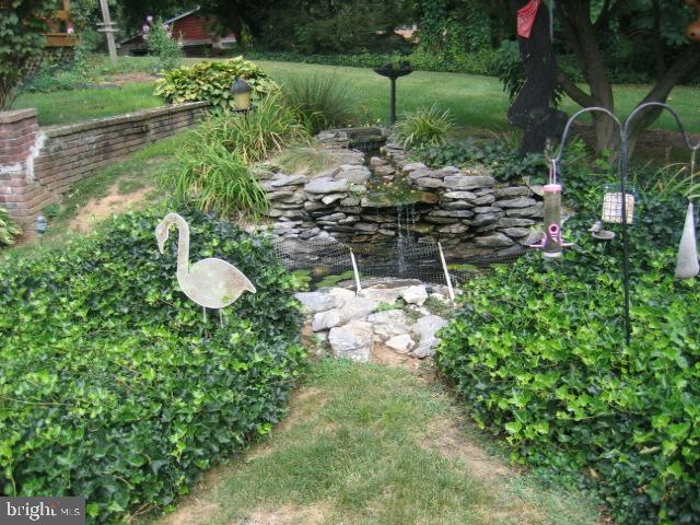 121 Royer Road Ephrata, PA 17522 - Photo 5 of 15 a backyard of a house with table and chairs