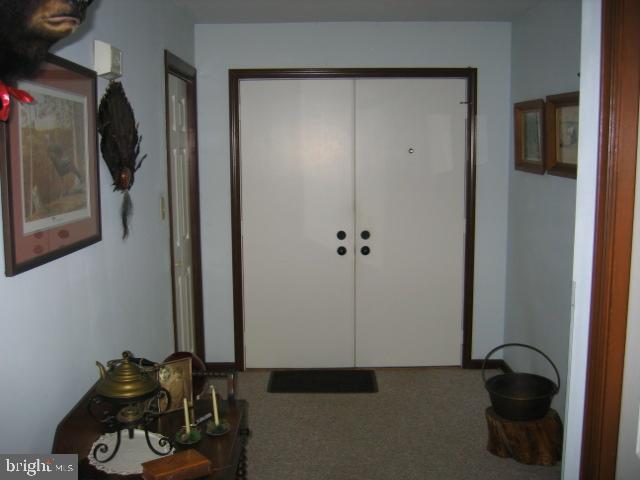 121 Royer Road Ephrata, PA 17522 - Photo 6 of 15 a room with a door and a wooden door