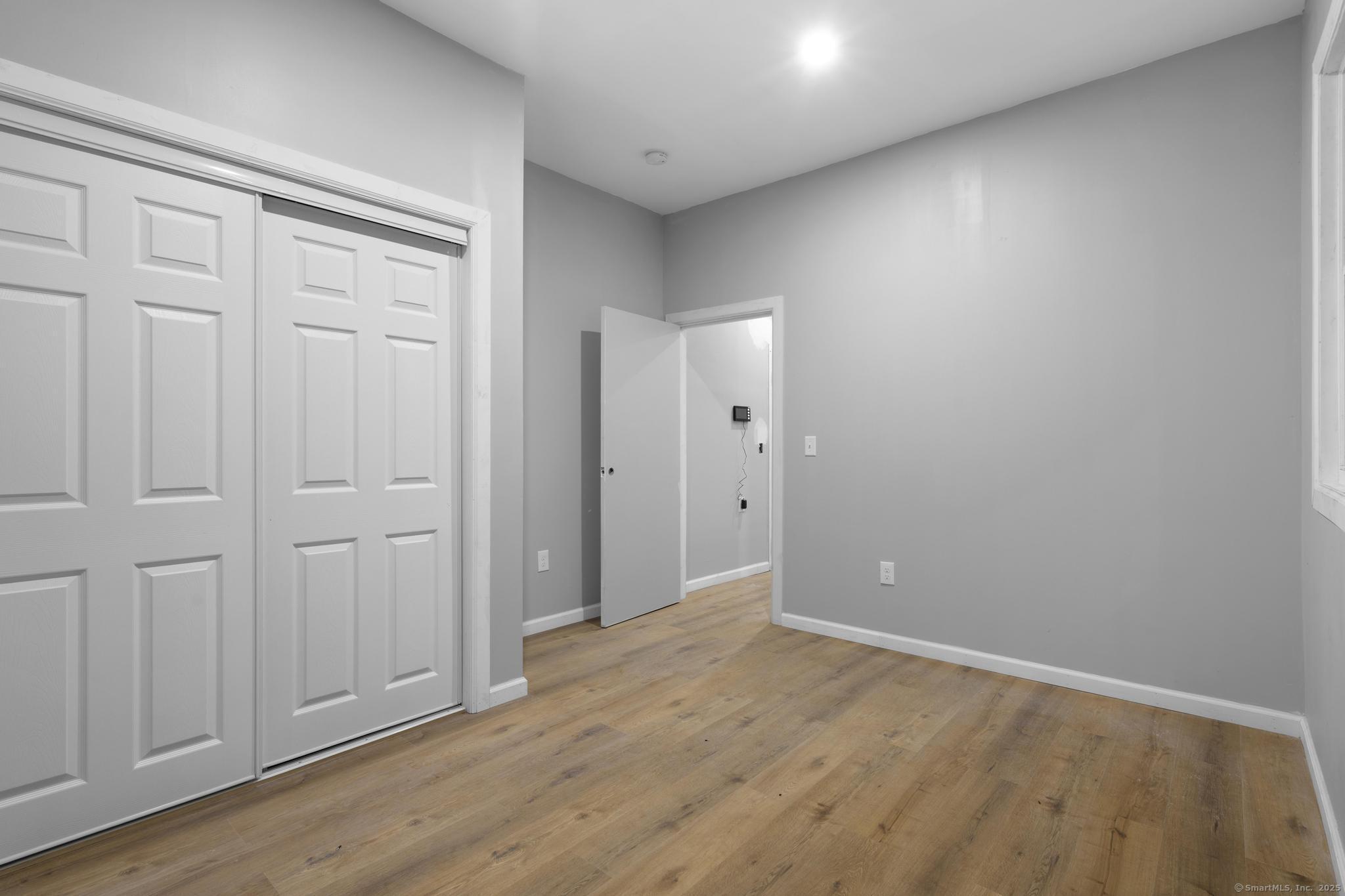 140 Grand Street, Unit 2C Waterbury, CT 06702 - Photo 11 of 13 a view of an empty room