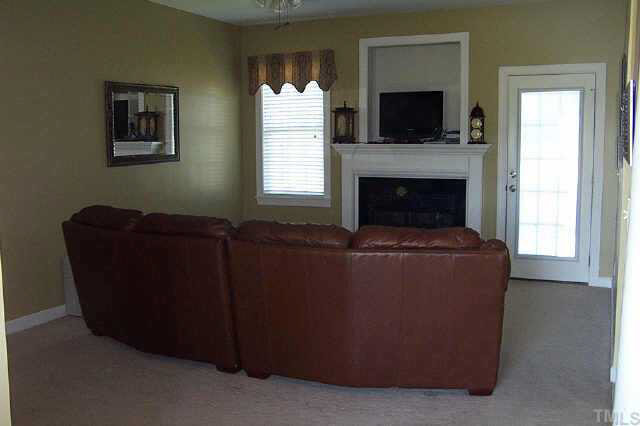 1001 Ridge Valley Way Zebulon, NC 27597 - Photo 5 of 10 Family Room and Fireplace