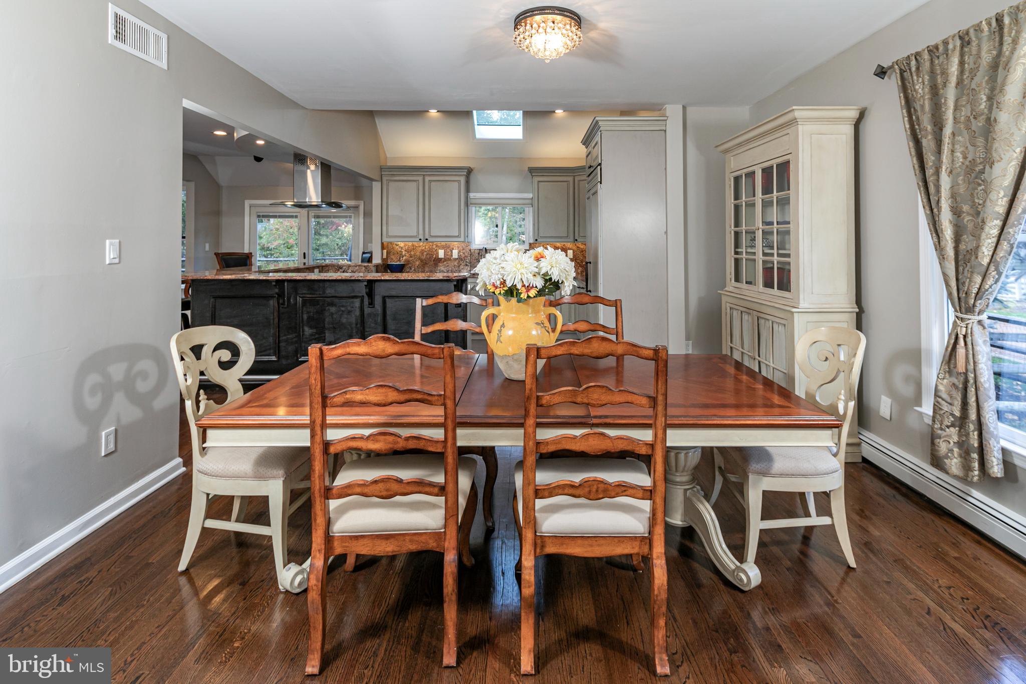 45 Willow Road Lawrenceville, NJ 08648 - Photo 13 of 32 a view of a dining room with furniture and wooden floor