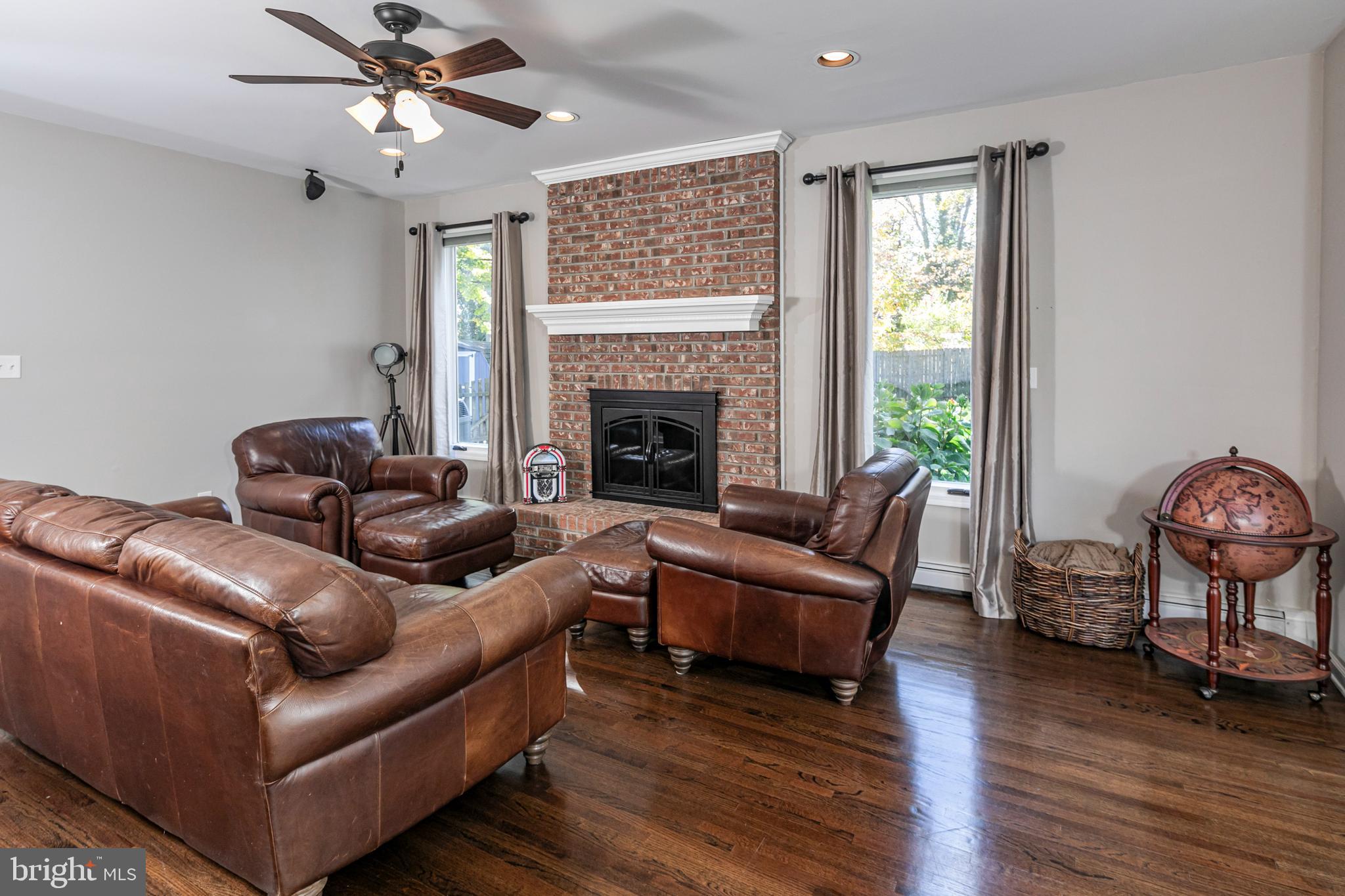 45 Willow Road Lawrenceville, NJ 08648 - Photo 14 of 32 a living room with furniture and a fireplace