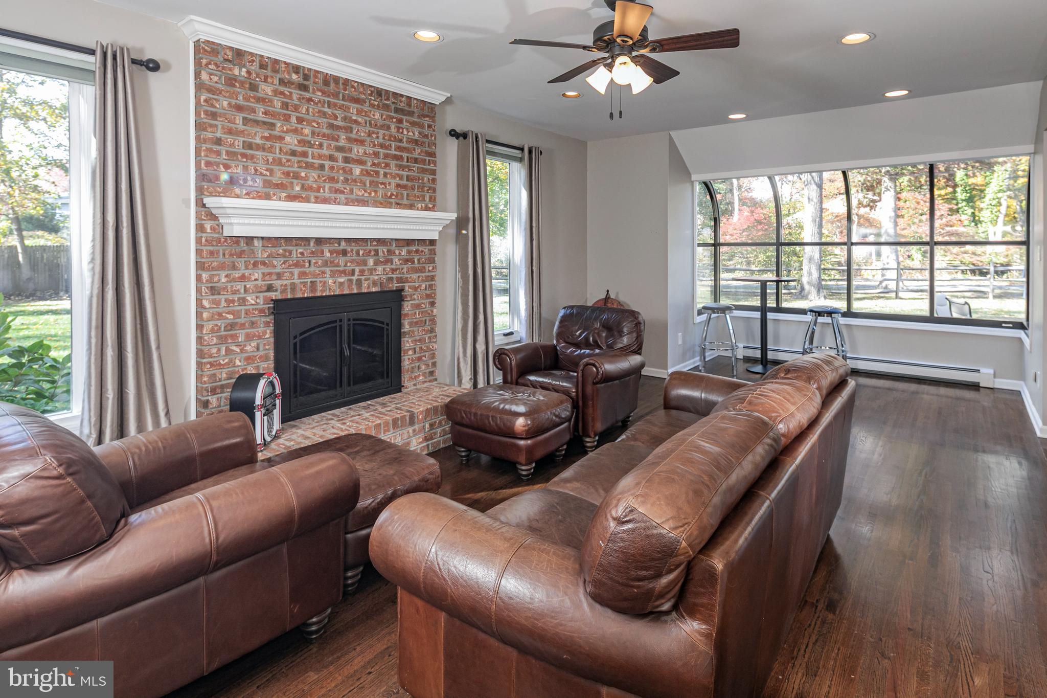 45 Willow Road Lawrenceville, NJ 08648 - Photo 16 of 32 a living room with furniture and a fireplace