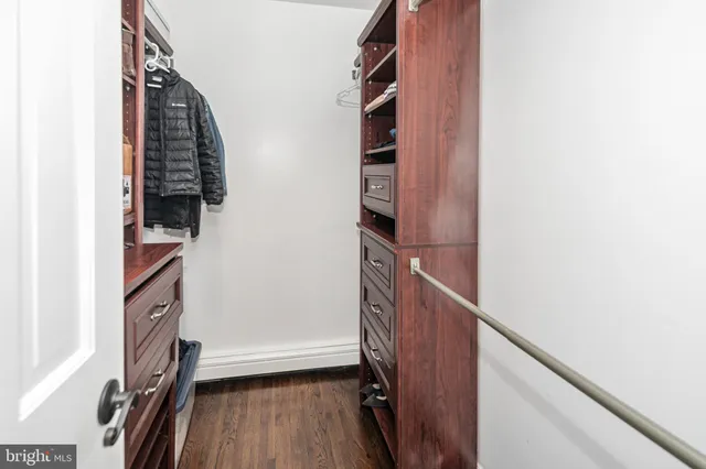 a view of stairs and hardwood floor