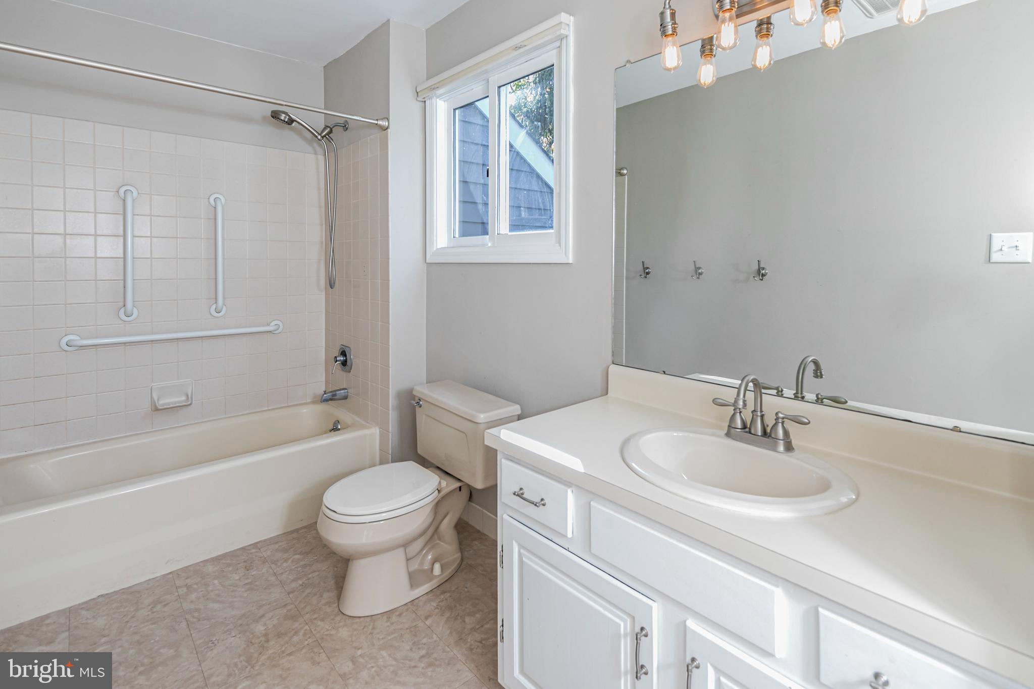 45 Willow Road Lawrenceville, NJ 08648 - Photo 26 of 32 a bathroom with a sink toilet tub and shower