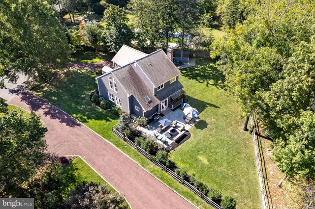 an aerial view of a house with a garden