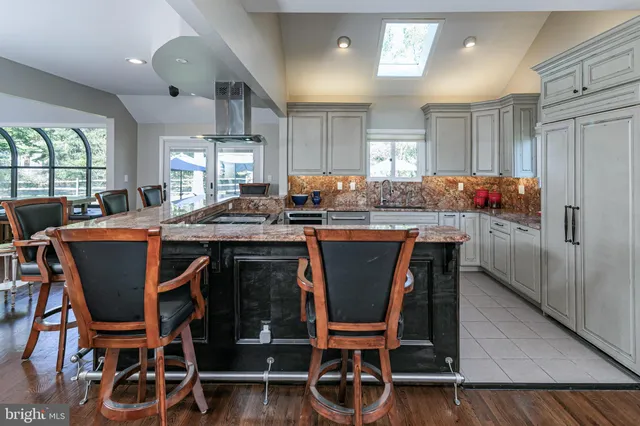 a view of a dining room with furniture and window