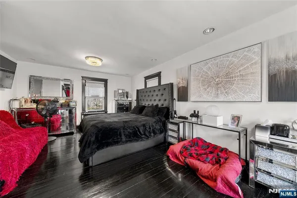 a bedroom with furniture and a couch