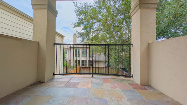 a view of a balcony with outdoor space