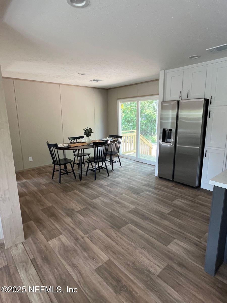 45692 Jones Way Callahan, FL 32011 - Photo 12 of 31 a view of a dining room with furniture window and outside view