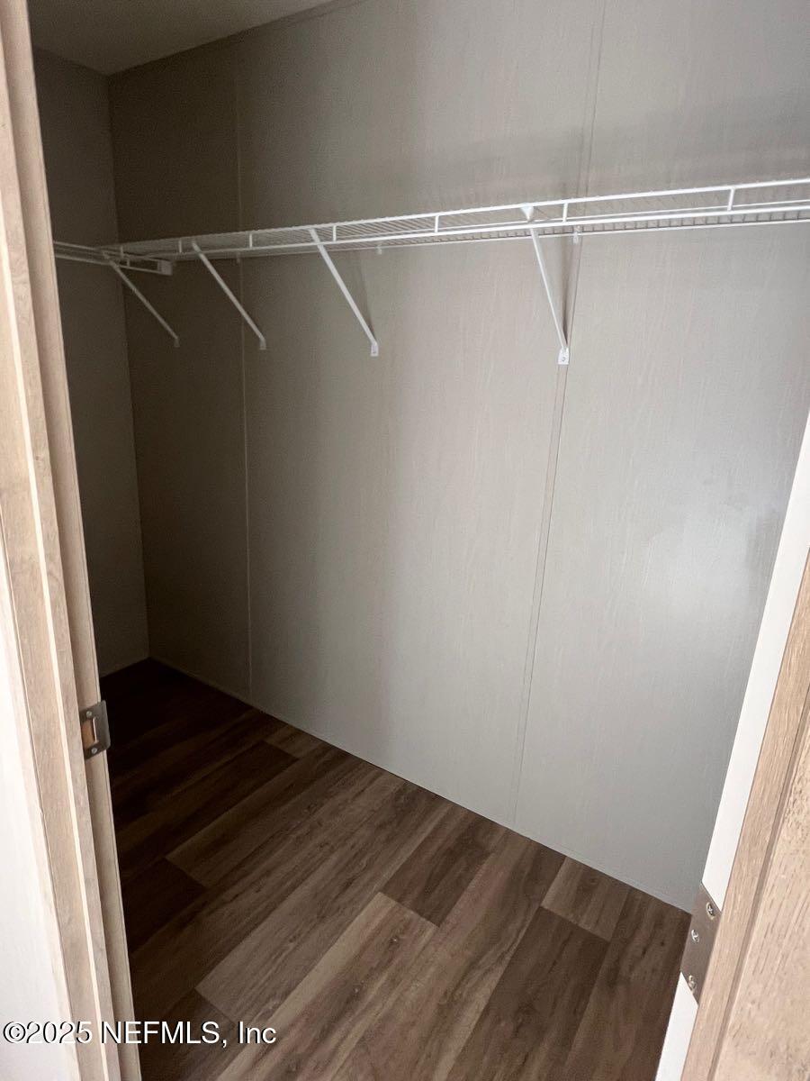 45692 Jones Way Callahan, FL 32011 - Photo 20 of 31 a view of a room with wooden floor