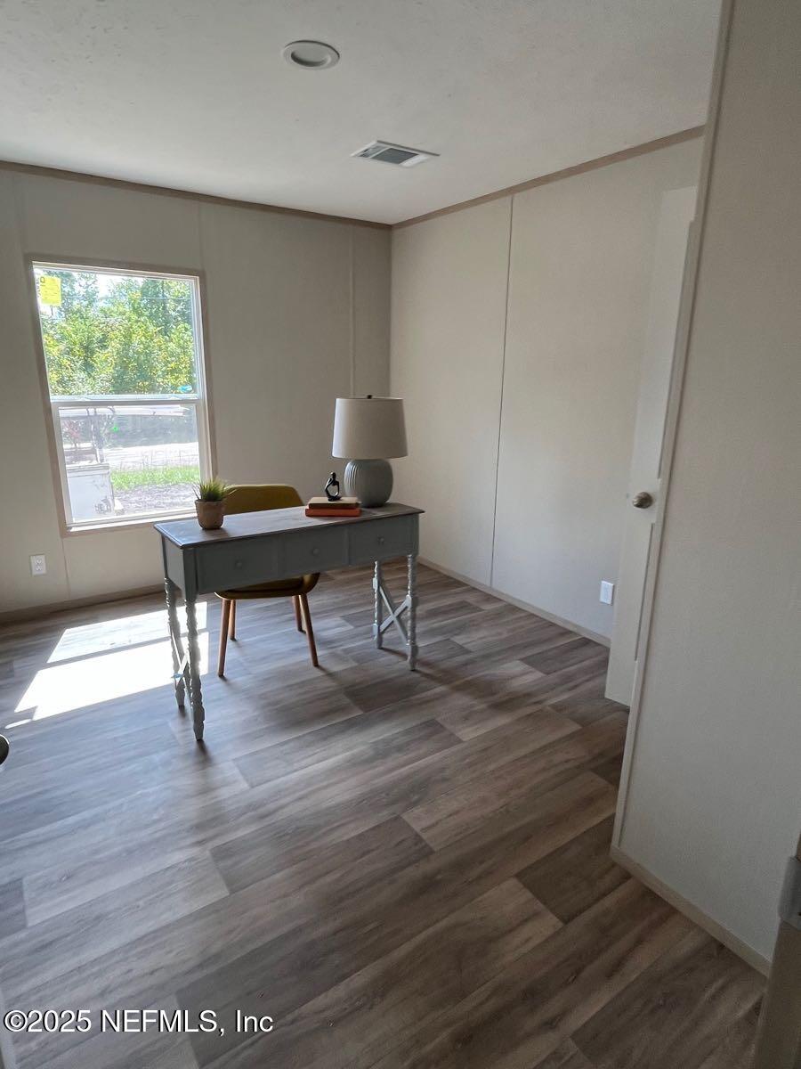 45692 Jones Way Callahan, FL 32011 - Photo 21 of 31 a view of a workspace with furniture and a window