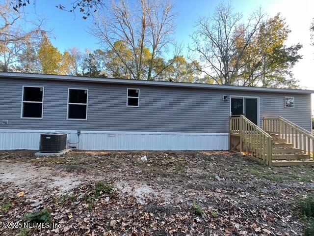 45692 Jones Way Callahan, FL 32011 - Photo 29 of 31 a house with trees in the background