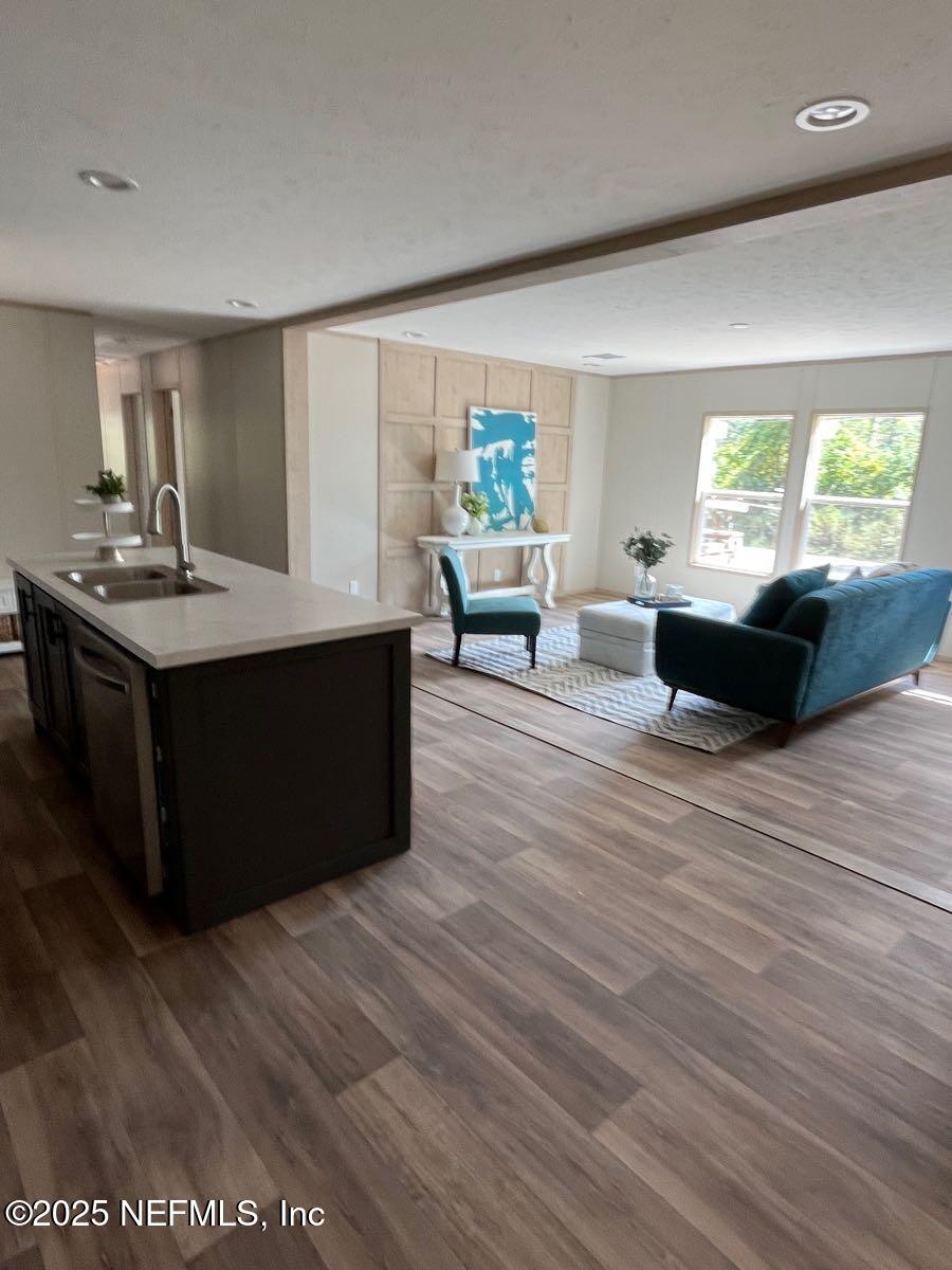 45692 Jones Way Callahan, FL 32011 - Photo 4 of 31 a living room with furniture and a large window