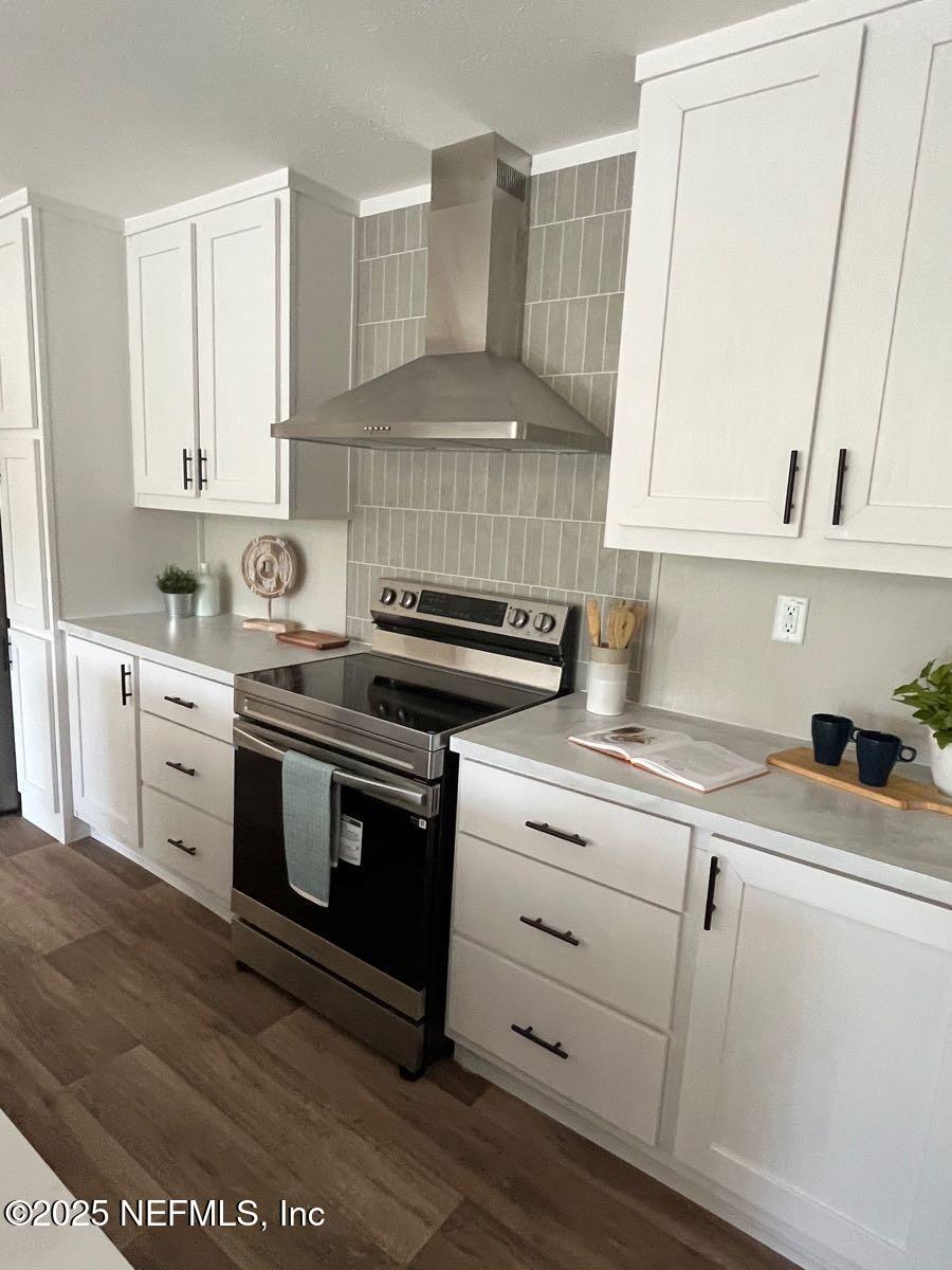 45692 Jones Way Callahan, FL 32011 - Photo 8 of 31 a kitchen with appliances cabinets and a sink