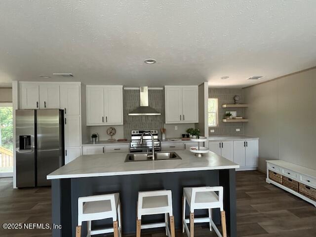 45692 Jones Way Callahan, FL 32011 - Photo 9 of 31 a kitchen with a sink cabinets and refrigerator