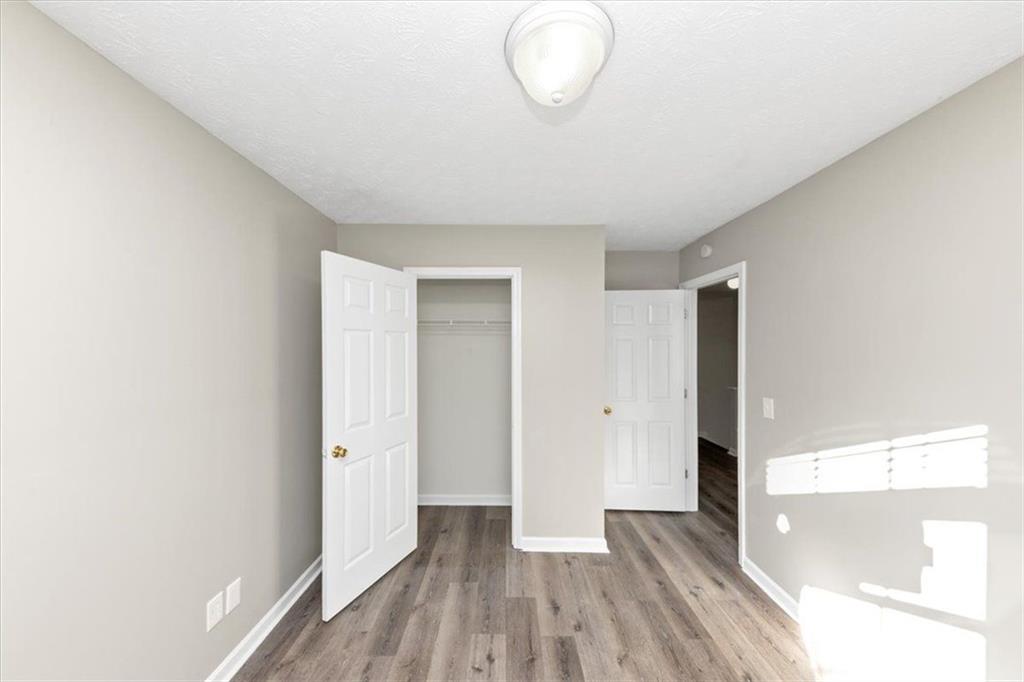 4169 Riverbank Court Decatur, GA 30034 - Photo 18 of 32 a view of a room with wooden floor