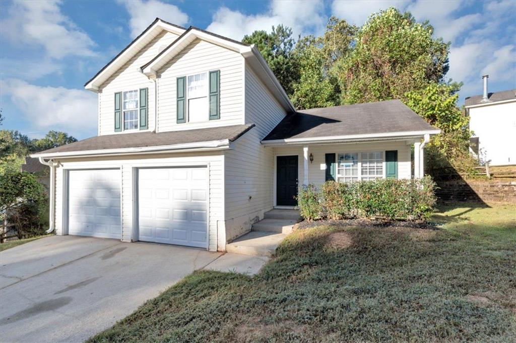 4169 Riverbank Court Decatur, GA 30034 - Photo 2 of 32 front view of a house with a yard