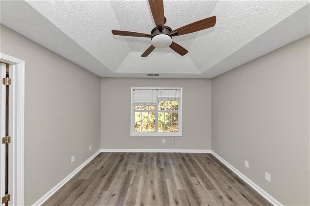 4169 Riverbank Court Decatur, GA 30034 - Photo 21 of 32 a view of an empty room and a window