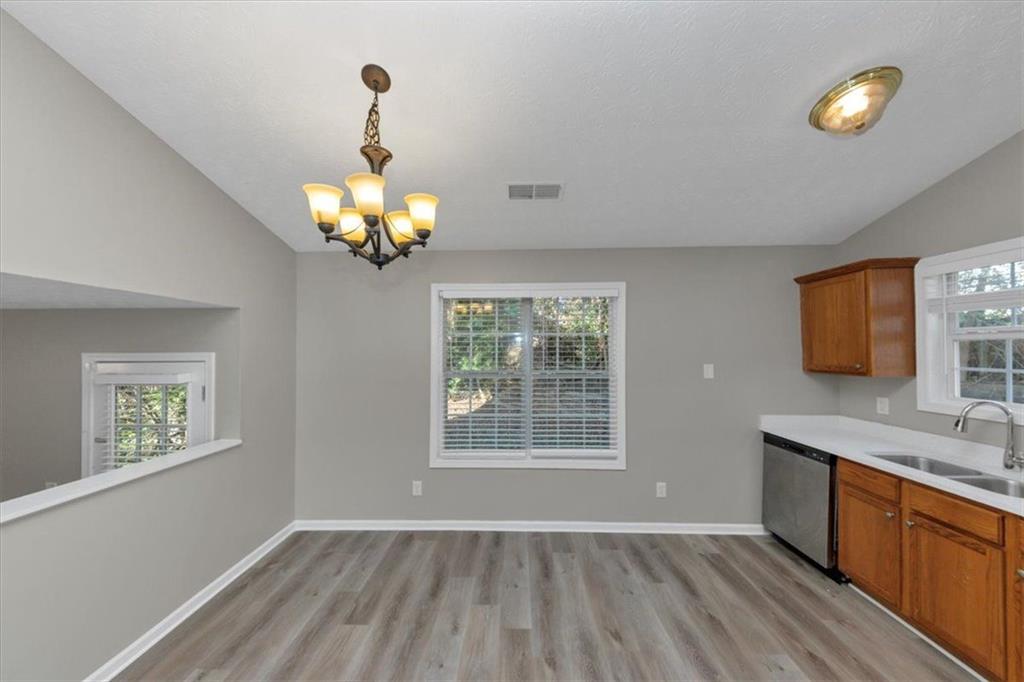 4169 Riverbank Court Decatur, GA 30034 - Photo 6 of 32 a bathroom with a sink mirror and a window