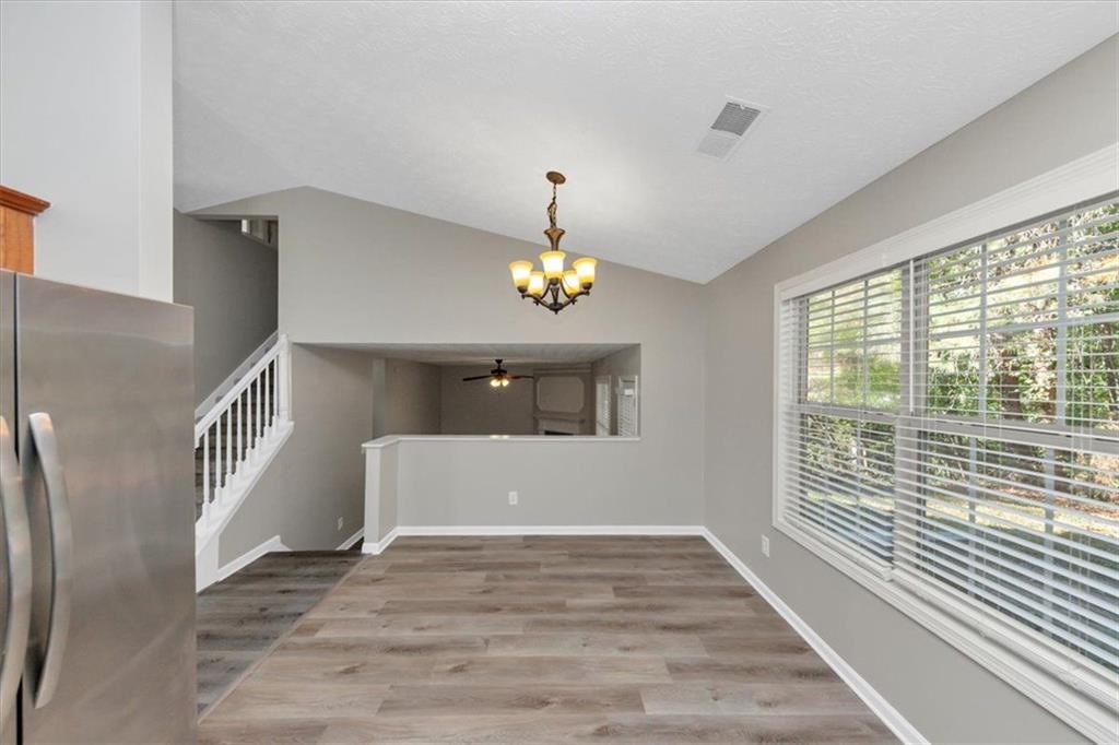 4169 Riverbank Court Decatur, GA 30034 - Photo 7 of 32 a view of an entryway with wooden floor