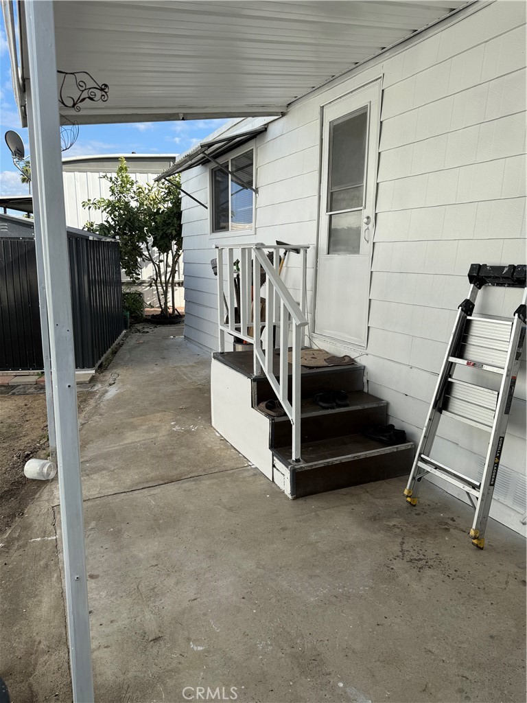 4117 West McFadden Avenue Santa Ana, CA 92704 - Photo 22 of 26 a view of stairs and an outdoor kitchen