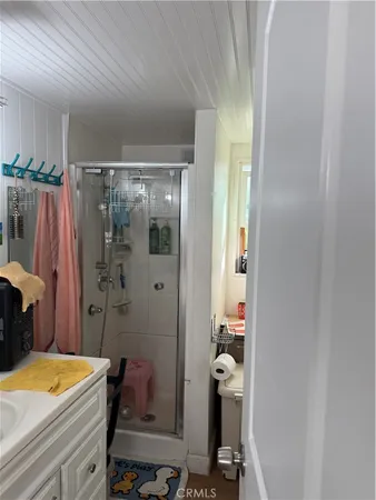 a room with a mirror and a window