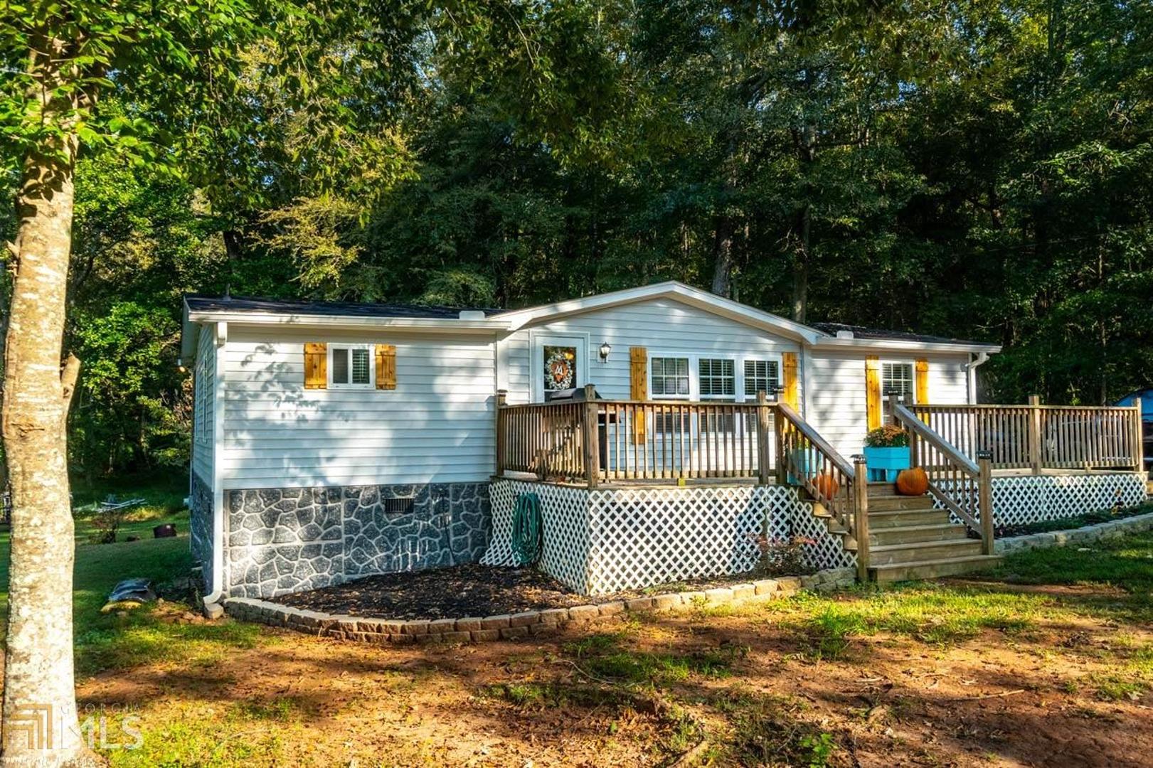 472 Moon Road Griffin, GA 30223 - Photo 1 of 1 a view of a house with a yard