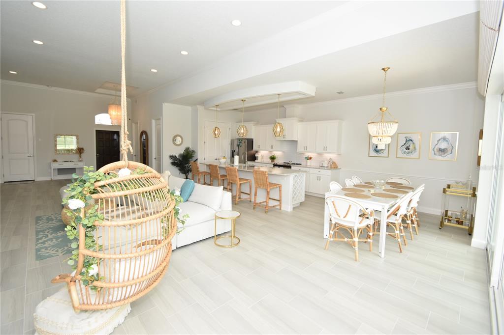 114 Del Palma Drive Palm Coast, FL 32137 - Photo 21 of 63 a dining room with a table and chairs